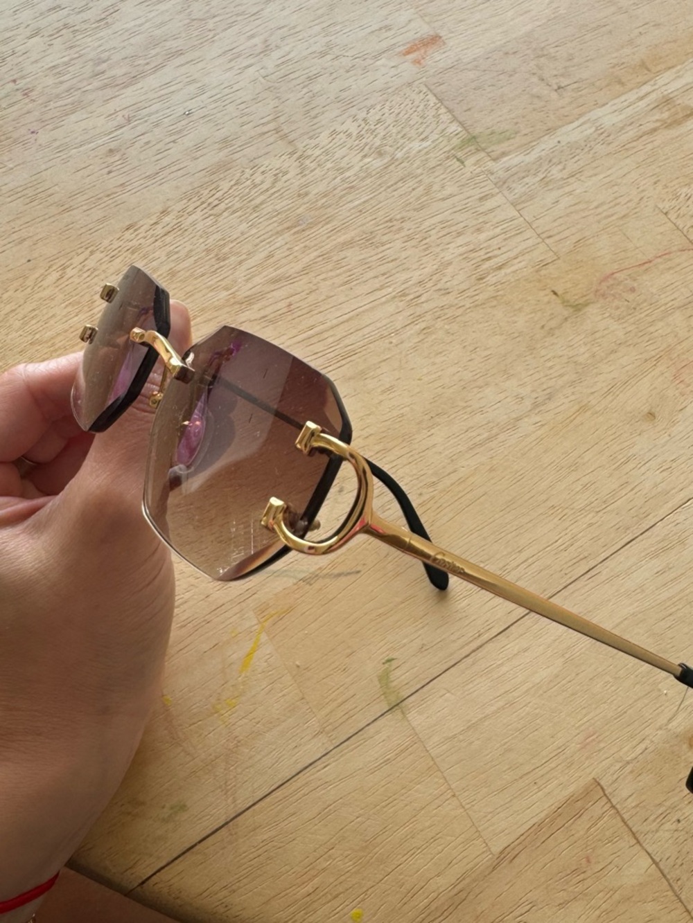 Cartier Women's Gold Frame Sunglasses with Purple Gradient Lenses